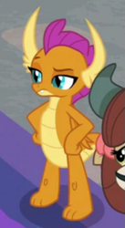 Size: 391x712 | Tagged: safe, screencap, smolder, yona, dragon, yak, g4, the hearth's warming club, cropped, dragoness, female, hand on hip, raised eyebrow, smolder is not amused, solo focus, unamused