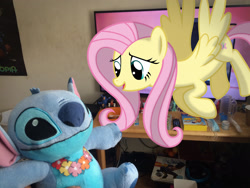 Size: 3264x2448 | Tagged: safe, artist:mlptmntfan2000, fluttershy, alien, pegasus, pony, g4, disney, female, high res, irl, lilo and stitch, mare, photo, plushie, ponies in real life, stitch