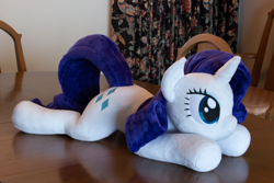 Size: 5184x3456 | Tagged: safe, artist:azgchip, rarity, pony, unicorn, g4, female, irl, lying down, mare, photo, plushie, prone, solo, table