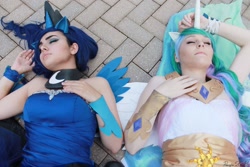 Size: 2048x1365 | Tagged: safe, artist:artisticdoe, artist:atemumustang, princess celestia, princess luna, human, g4, bare shoulders, clothes, cosplay, costume, eyes closed, irl, irl human, lying down, on back, photo, royal sisters, siblings, sisters, sleeveless