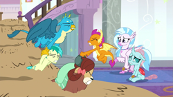 Size: 1279x719 | Tagged: safe, screencap, gallus, ocellus, sandbar, silverstream, smolder, yona, changedling, changeling, classical hippogriff, dragon, earth pony, griffon, hippogriff, pony, yak, a matter of principals, g4, bow, eyes closed, gritted teeth, hair bow, jewelry, monkey swings, necklace, quicksand, student six, teeth