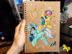 Size: 4096x3072 | Tagged: safe, artist:julunis14, bon bon, lyra heartstrings, sweetie drops, earth pony, pony, unicorn, g4, hand, irl, music notes, notebook, photo, traditional art