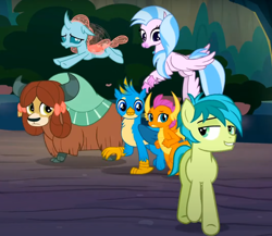 Size: 892x773 | Tagged: safe, screencap, gallus, ocellus, sandbar, silverstream, smolder, yona, changedling, changeling, classical hippogriff, dragon, earth pony, griffon, hippogriff, pony, yak, g4, uprooted, bow, cloven hooves, cropped, dragoness, female, flying, hair bow, jewelry, lidded eyes, male, monkey swings, necklace, student six