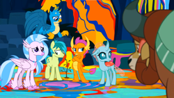 Size: 1600x900 | Tagged: safe, screencap, gallus, ocellus, sandbar, silverstream, smolder, yona, changedling, changeling, classical hippogriff, dragon, earth pony, griffon, hippogriff, pony, yak, g4, uprooted, bow, colored hooves, crossed arms, dragoness, female, hair bow, jewelry, male, monkey swings, necklace, paint, sapling, student six