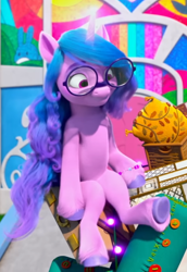 Size: 474x689 | Tagged: safe, screencap, izzy moonbow, pony, unicorn, g5, izzy does it, my little pony: make your mark, my little pony: make your mark chapter 2, spoiler:my little pony: make your mark chapter 2, spoiler:mymc02e01, cropped, glasses, glowing, glowing horn, horn, sitting, sitting like a human, solo, underhoof