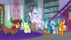 Size: 1600x898 | Tagged: safe, screencap, gallus, ocellus, sandbar, silverstream, smolder, yona, changedling, changeling, classical hippogriff, dragon, earth pony, griffon, hippogriff, pony, yak, g4, school raze, book, bookshelf, bow, cloven hooves, colored hooves, dragoness, female, hair bow, jewelry, ladder, male, monkey swings, necklace, school of friendship, spread wings, student six, wings