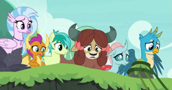 Size: 1291x683 | Tagged: safe, screencap, gallus, ocellus, sandbar, silverstream, smolder, yona, changedling, changeling, classical hippogriff, dragon, earth pony, griffon, hippogriff, pony, yak, g4, non-compete clause, cropped, looking down, student six