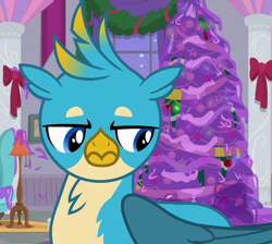 Size: 804x719 | Tagged: safe, screencap, gallus, griffon, g4, the hearth's warming club, christmas, christmas tree, cropped, gallus is not amused, holiday, male, solo, tree, unamused