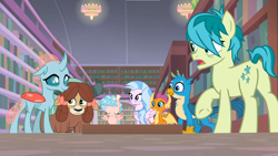 Size: 1600x900 | Tagged: safe, screencap, cozy glow, gallus, ocellus, sandbar, silverstream, smolder, yona, changedling, changeling, classical hippogriff, dragon, earth pony, griffon, hippogriff, pegasus, pony, yak, g4, what lies beneath, bookshelf, bow, butt, female, filly, foal, hair bow, jewelry, monkey swings, necklace, plot, student six, teenager, tired