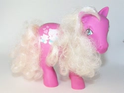 Size: 615x461 | Tagged: safe, mommy pony, earth pony, pony, g1, blue eyes, female, irl, mare, mother, photo, solo, tail, toy