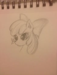 Size: 768x1024 | Tagged: safe, artist:bmwjs, apple bloom, earth pony, pony, g4, apple bloom's bow, bow, bust, female, filly, foal, hair bow, notebook, portrait, solo, traditional art