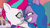 Size: 1294x722 | Tagged: safe, screencap, izzy moonbow, zipp storm, pegasus, pony, unicorn, g5, my little pony: tell your tale, secret ad-mare-er, spoiler:g5, spoiler:my little pony: tell your tale, bracelet, duo, duo female, evil smile, female, friendship bracelet, frown, grin, jewelry, mare, smiling, sweat, sweatdrop