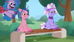 Size: 3072x1727 | Tagged: safe, screencap, elderberry blossom, izzy moonbow, plum library, pony, unicorn, g5, my little pony: tell your tale, secret ad-mare-er, spoiler:g5, spoiler:my little pony: tell your tale, spoiler:tyts01e44, bench, female, indonesian, mare, open mouth, open smile, smiling, subtitles, trio, trio female, unnamed character, unnamed pony