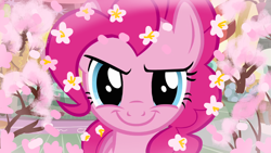 Size: 1280x720 | Tagged: safe, edit, edited screencap, editor:horsesplease, screencap, pinkie pie, dryad, earth pony, plant pony, pony, tree pony, a friend in deed, g4, season 2, adorabolical, bloom, cherry blossoms, close-up, cute, evil grin, flower, flower blossom, flower in hair, grin, looking at you, pink, sakura pie, smiling, smiling at you, smirk, solo, trapped, tree