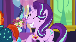 Size: 1280x720 | Tagged: safe, screencap, starlight glimmer, sunburst, pony, unicorn, celestial advice, g4, ^^, balloon, duo, equestrian pink heart of courage, eyes closed, female, grin, horn, jewelry, male, mare, smiling, stallion, twilight's castle