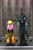 Size: 1365x2048 | Tagged: safe, artist:buckweiser, cherry berry, queen chrysalis, changeling, changeling queen, earth pony, pony, fanfic:changeling space program, g4, astronaut, duo, duo female, fanfic art, female, hangar, horrified, open mouth, raised hoof, spacesuit