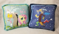 Size: 1500x877 | Tagged: safe, artist:coreyscorner, discord, fluttershy, butterfly, discordant harmony, g4, duo, duo male and female, female, irl, male, photo, pillow, product, selling