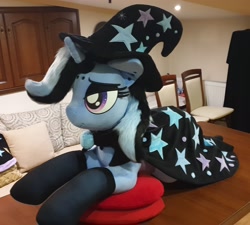 Size: 2468x2217 | Tagged: safe, artist:ponimalion, trixie, pony, unicorn, g4, altered cutie mark, bedroom eyes, brooch, cape, clothes, dyed mane, dyed tail, ear piercing, eyeshadow, female, goth, hat, high res, horn, horn ring, irl, jewelry, lidded eyes, life size, makeup, mare, photo, piercing, pillow, plushie, ring, smiling, solo, tail, trixie's brooch, trixie's cape, trixie's hat