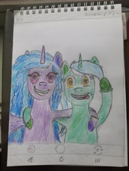 Size: 4032x3024 | Tagged: safe, artist:pink amena, izzy moonbow, lyra heartstrings, pony, unicorn, mlp fim's thirteenth anniversary, g4, g5, colored pencil drawing, doodle, duo, eye clipping through hair, generation leap, selfie, smiling, tongue out, traditional art