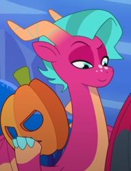 Size: 536x700 | Tagged: safe, screencap, blaize skysong, dragon, g5, lavarynth, my little pony: tell your tale, spoiler:g5, spoiler:my little pony: tell your tale, cropped, mask, pumpkin mask