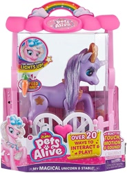 Size: 1103x1500 | Tagged: safe, pony, unicorn, ages 3+, bow, carrot, choking hazard, colored horn, concave belly, female, food, hair bow, horn, jewelry, mare, necklace, photo, simple background, solo, tinsel, toy, white background, zuru pets alive