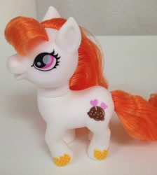 Size: 500x558 | Tagged: safe, earth pony, pony, bangs, bootleg, female, open mouth, photo, pink eyes, princess pony myths, solo, toy