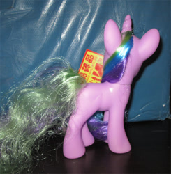 Size: 600x613 | Tagged: safe, holly dash, pony, unicorn, g4, bootleg, female, mare, photo, rear view, solo, styling size, toy