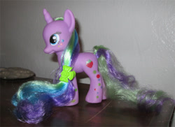 Size: 500x363 | Tagged: safe, holly dash, pony, unicorn, g4, bootleg, female, hairclip, long mane, mare, photo, solo, styling size, toy