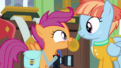 Size: 1280x720 | Tagged: safe, screencap, scootaloo, windy whistles, pegasus, pony, g4, parental glideance, bag, camera, cute, cutealoo, female, filly, foal, freckles, looking at each other, looking at someone, mare, open mouth, open smile, saddle bag, smiling, smiling at each other, windybetes