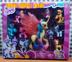 Size: 500x425 | Tagged: safe, apple bloom, applejack, fluttershy, pinkie pie, princess cadance, princess celestia, princess flurry heart, princess gold lily, rainbow dash, spike, sweetie belle, alicorn, dragon, earth pony, pony, unicorn, g4, ages 3+, baby, baby pony, blind bag, bootleg, chinese, choking hazard, crown, female, filly, foal, fun lovely pony, jewelry, mare, photo, regalia, stock vector, stolen fanart, tiara, toy, transparent wings, wings