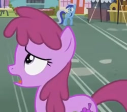 Size: 657x577 | Tagged: safe, screencap, berry punch, berryshine, minuette, earth pony, pony, unicorn, g4, ponyville confidential, season 2, animation error, cropped, female, frown, looking back, mare, open mouth, solo focus, turned head, wrong eye color