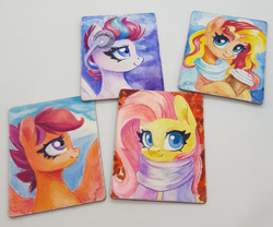 Size: 1204x1000 | Tagged: safe, artist:maytee, fluttershy, scootaloo, sunset shimmer, zipp storm, pegasus, pony, unicorn, g4, g5, bust, clothes, coffee, coffee cup, cup, headphones, magnet, portrait, scarf, spread wings, traditional art, watercolor painting, wings