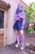 Size: 2871x4306 | Tagged: safe, artist:hysteriana, izzy moonbow, human, bronycon, g5, blue hair, brony, choker, clothes, cosplay, costume, female, festival, irl, irl human, outdoors, photo, schoolgirl, skirt, socks, solo, stockings, sweater, thigh highs