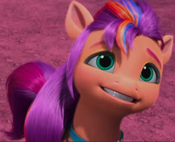 Size: 1205x974 | Tagged: safe, screencap, sunny starscout, earth pony, pony, g5, my little pony: make your mark, my little pony: make your mark chapter 6, the isle of scaly, spoiler:g5, cropped, female, mare, smiling, solo, the isle of scaly (location)