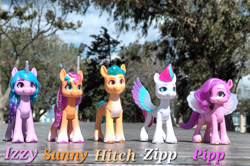 Size: 1097x728 | Tagged: safe, artist:dingopatagonico, hitch trailblazer, izzy moonbow, pipp petals, sunny starscout, zipp storm, earth pony, pegasus, pony, unicorn, g5, female, male, mane five, mane stripe sunny, mare, photo, pipp is short, stallion, toy