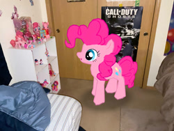 Size: 828x621 | Tagged: safe, artist:thebronypony123, gameloft, pinkie pie, earth pony, pony, g4, my little pony: magic princess, bedroom, call of duty, call of duty: ghosts, collection, figure, irl, photo, poster, solo