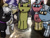 Size: 749x562 | Tagged: safe, artist:foxfer64_yt, oc, oc:onyxstar (fl), oc:silverstream (robot pony), oc:thunder (fl), oc:trackhead, oc:twostep, earth pony, original species, pegasus, pony, robot, robot pony, wheelpone, confused, curious, female, group, happy, irl, looking down, madrid, male, mare, photo, spain, stallion, talking