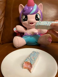 Size: 4032x3024 | Tagged: safe, photographer:buceps, princess flurry heart, human, g4, cute, feeding, flurrybetes, irl, irl human, merchandise, photo, unicorn food