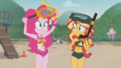 Size: 800x450 | Tagged: safe, screencap, pinkie pie, sunset shimmer, human, equestria girls, g4, beach, belly, belly button, clothes, female, midriff, one-piece swimsuit, pinkie pie swimsuit, snorkel, sunset shimmer swimsuit, sunset shimmer's beach shorts swimsuit, swimsuit