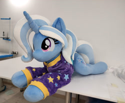 Size: 4208x3472 | Tagged: safe, artist:lanacraft, trixie, pony, unicorn, g4, alternate hairstyle, babysitter trixie, clothes, hoodie, irl, lying down, photo, plushie, prone, smiling, solo, sploot