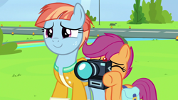 Size: 1280x720 | Tagged: safe, screencap, scootaloo, windy whistles, pegasus, pony, g4, parental glideance, bag, camera, camera shot, clothes, cute, cutealoo, duo, female, filly, foal, freckles, jacket, mare, saddle bag, smiling, windybetes
