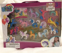 Size: 1080x920 | Tagged: safe, alicorn, earth pony, pony, unicorn, ages 3+, bootleg, choking hazard, collect them all, dd's discounts, irl, jumping, my lovely horse, photo, rearing, toy