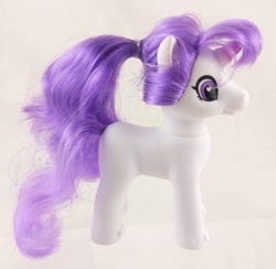 Size: 2359x2298 | Tagged: safe, pony, unicorn, bootleg, colored horn, female, high res, horn, incorrect hair placement, irl, not rarity, photo, ponytail, simple background, standing, toy, white background, zuru sparkle girlz