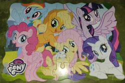 Size: 4029x2672 | Tagged: safe, angel bunny, applejack, fluttershy, pinkie pie, rainbow dash, rarity, twilight sparkle, alicorn, earth pony, pegasus, pony, rabbit, unicorn, g4, animal, female, irl, mane six, mare, my little pony logo, open mouth, photo, puzzle, spread wings, twilight sparkle (alicorn), wings