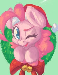 Size: 1582x2048 | Tagged: safe, artist:leadhooves, pinkie pie, earth pony, pony, g4, christmas, christmas wreath, female, green background, hat, holiday, looking at you, mare, one eye closed, santa hat, simple background, smiling, smiling at you, solo, unshorn fetlocks, wink, winking at you, wreath