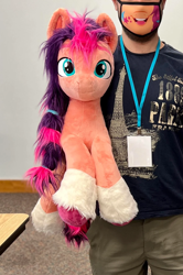 Size: 1184x1781 | Tagged: safe, artist:epicrainbowcrafts, sunny starscout, earth pony, human, pony, trotcon, g5, convention, cropped, female, irl, irl human, life size, mare, mask, photo, plushie, solo focus, unshorn fetlocks