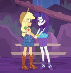 Size: 392x401 | Tagged: safe, screencap, applejack, rarity, human, equestria girls, g4, apple, belt, blushing, boots, clothes, collar, denim, denim skirt, food, high heels, holding hands, implied lesbian, implied rarijack, implied shipping, looking at each other, looking at someone, pocket, pockets, rarity peplum dress, shipping fuel, shirt, shoes, skirt, teenager, water, waterfall