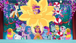 Size: 3072x1727 | Tagged: safe, screencap, cloudpuff, dahlia, hitch trailblazer, izzy moonbow, minty skylark, misty brightdawn, pipp petals, queen haven, rocky riff, rufus, sparky sparkeroni, sunny starscout, zipp storm, alicorn, dog, dragon, earth pony, flying pomeranian, pegasus, pomeranian, pony, unicorn, equestria's got talent, g5, my little pony: tell your tale, spoiler:g5, spoiler:my little pony: tell your tale, spoiler:tyts01e69, baby, baby dragon, cute, female, flying, indonesian, male, mane five, mane six (g5), mare, microphone, open mouth, open smile, papa hitch, party cannon, race swap, rebirth misty, royal sisters (g5), siblings, sisters, smiling, sparkybetes, spread wings, stallion, subtitles, sunnycorn, unnamed character, winged dog, wings