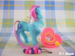 Size: 762x569 | Tagged: safe, springdy, earth pony, pony, g2, bead machine, beads, comb, female, irl, mare, photo, raised hoof, solo, tail, toy, unshorn fetlocks