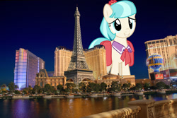Size: 2249x1500 | Tagged: safe, artist:thatguy1945, artist:theotterpony, coco pommel, earth pony, pony, g4, bag, female, giant pony, giantess, highrise ponies, irl, las vegas, macro, mare, necktie, nevada, photo, ponies in real life, saddle bag, smiling, solo